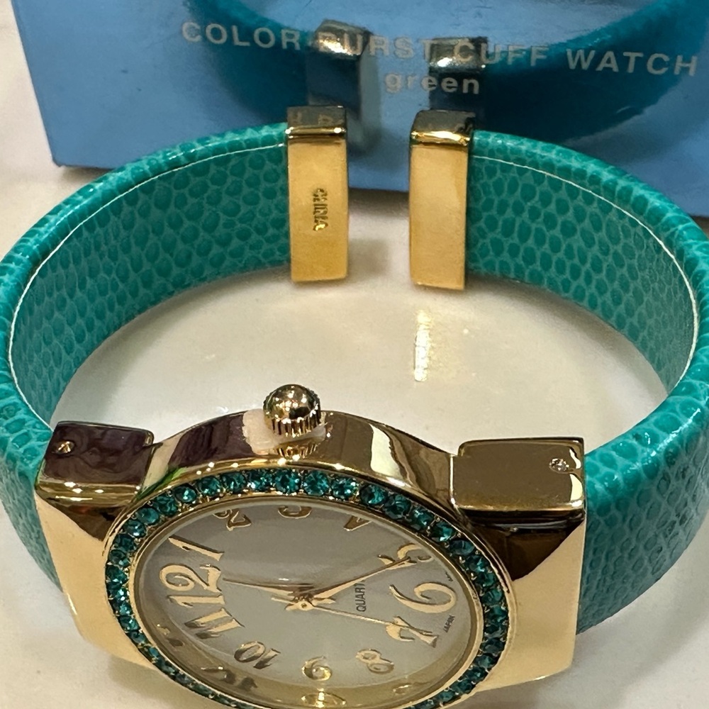 Avon colord burst cuff Geneva Turquoise and Gold Watch(vintage )